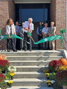 Ribbon cutting at new addition of New England Wire